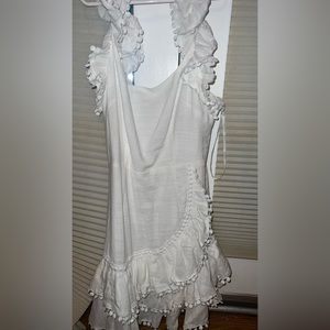 white ruffley dress